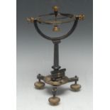 An early 20th century brass and black painted surveyor's instrument, with compass,