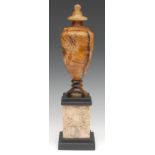 An early 19th century Derbyshire Blue John pedestal urn, integrated cover, ball finial, Five vein,