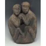 A Medieval sandstone carving, depicting two primitive figures,