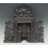 A Victorian cast iron miniature fire place,