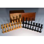 A boxwood and ebony Staunton pattern weighted chess set, the Kings 9.