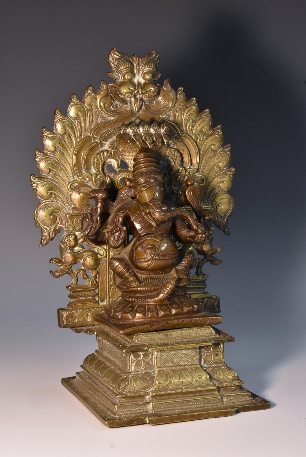 An Indian bronze shrine figure, cast as Ganesha, 24cm high,