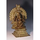 An Indian bronze shrine figure, cast as Ganesha, 24cm high,