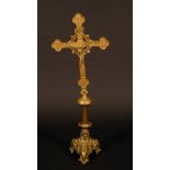 A Medieval Revival gilt brass alter Corpus Christi, of Christ crucified on a cross bottony,