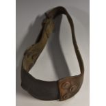 An 18th/19th century iron and leather fighting dog collar, copper-riveted construction,