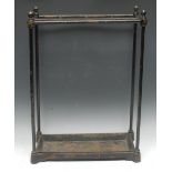 A Victorian brass and cast iron rectangular six-section walking stick stand, ball finials,
