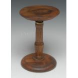 A 19th century mahogany table top candle stand, turned top, pillar and base,