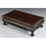 A large Chinese hardwood rectangular table top stand,