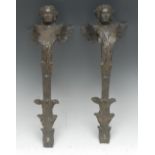 A pair of substantial 19th century French brown-patinated bronze figural architectural fittings,