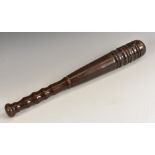 A 19th century turned mahogany truncheon, quite plain, 40.