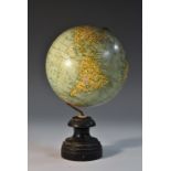 A 5" terrestrial desk globe, by G Thomas, Paris, turned ebonised base, 21cm high,