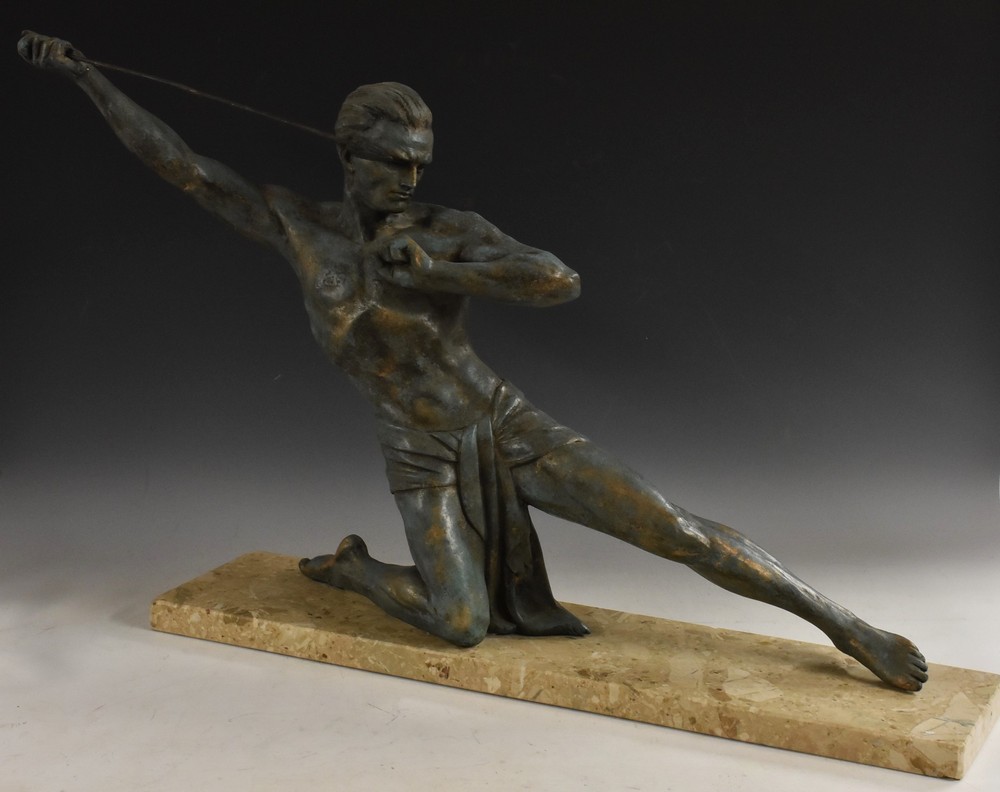 French School, an Art Deco verdigis patinated sculpture, The Spear Thrower, rectangular marble base,