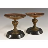 A pair of 19th century French tazzas, dished circular tops centred by lotus bosses,