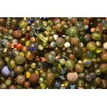 A collection of 19th century and later glass marbles, various opaque and clear glass,
