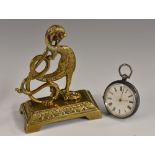 A 19th century brass pocket watch stand, cast as a griffin, spreading base with bracket feet,
