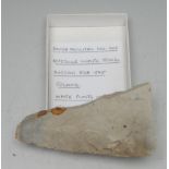 Antiquities - Stone Age, a Danish white flint disc axe, with orange/brown spots, 10cm long,