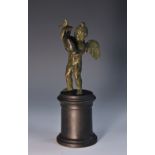 Grand Tour School (19th century), a verdigris patinated bronze, of a winged putto with a dolphin,