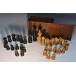 An early 20th century boxwood and ebony Calvert type chess set, the Kings 10.