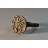 Antiquities - an Anglo-Saxon dark-patinated bronze ring, the 1.