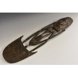 Tribal Art - a Papua New Guinea figural food hook, the 'crocodile man' with stylised oval features,