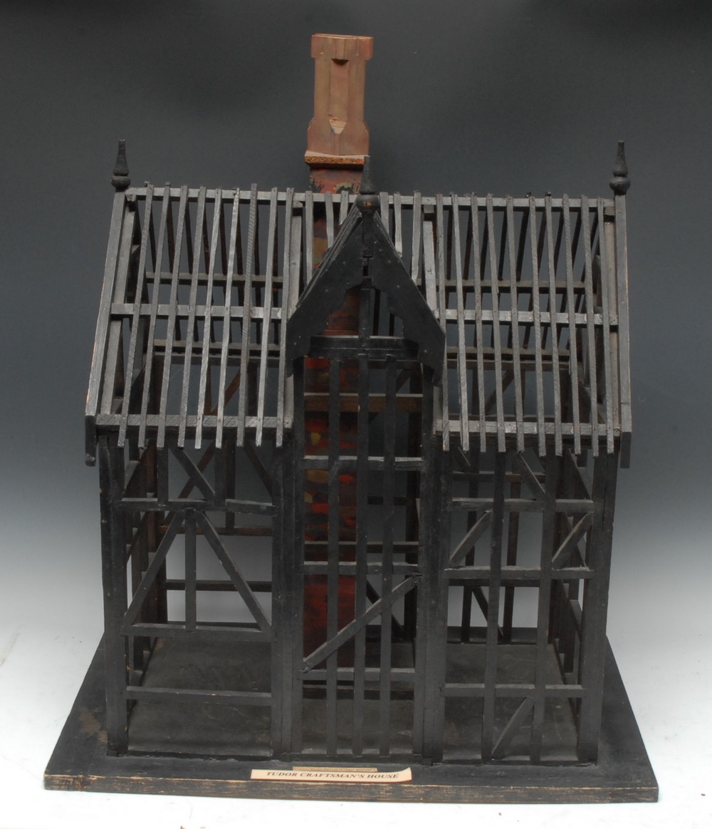 A softwood museum architectural model, of a Tudor Craftsman's House, labelled, 68cm high,