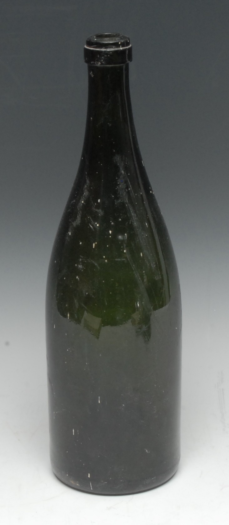 A 19th century green glass wine bottle, kick-up base,