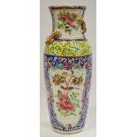 A late 19th century Chinese famille rose baluster shaped vase