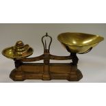 A gilt metal W. Avery set of scales to weigh 4 Lb, with various weights; c.