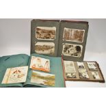 An Edwardian postcard album holding various early 20th century examples including nursing interest,