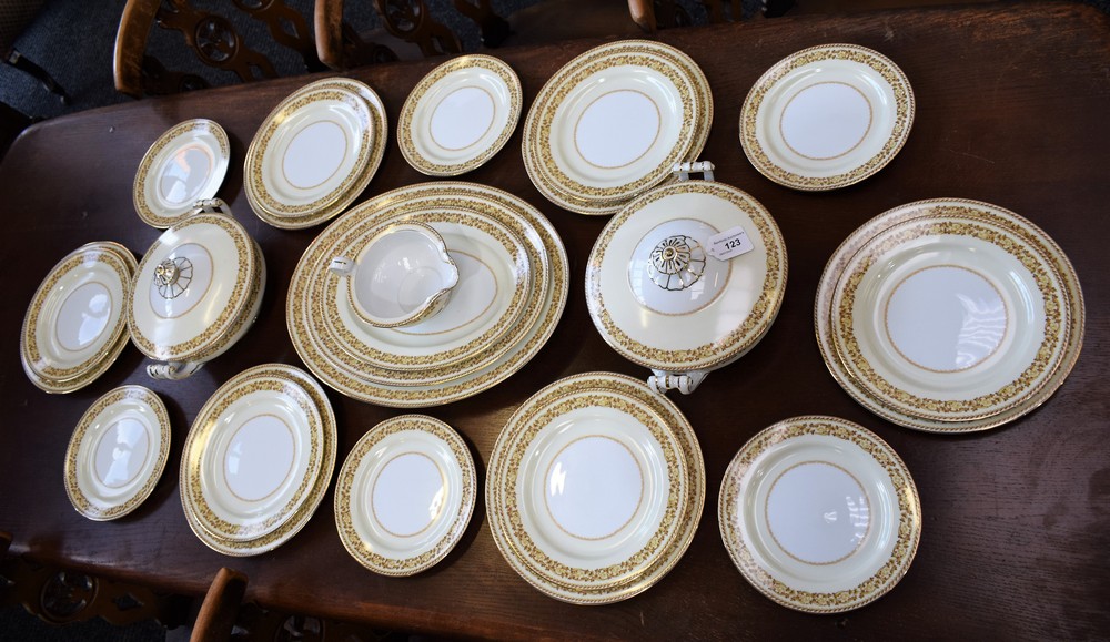 A Noritake six setting dinner service including tureens, oval graduated meat plates; sauce boat,