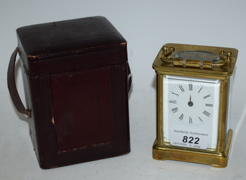 A 19th century brass carriage clock, in fitted leather case,