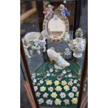 Ceramics - a Continental porcelain figural two branch candelabra, Motley Jester,