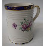 A Derby slightly spreading cylindrical mug, of silver shape,