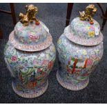 A pair of Chinese Famille Rose temple jars and covers,