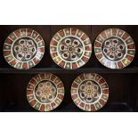 A set of five Royal Crown Derby 1128 pattern dinner plates,