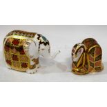 A Royal Crown Derby paperweight, Elephant, printed with the 1128 pattern, gold stopper,