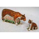 A Royal Crown Derby paperweight, Sumatran Tigress, gold stopper, boxed; another, Sumatran Tiger Cub,