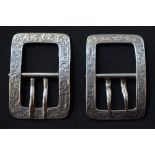 A pair of Victorian silver shoe buckles, engraved with scrolling foliage, 4cm wide,