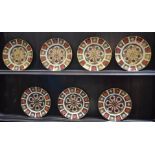 A set of seven Royal Crown Derby 1128 pattern dessert plates,