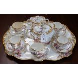 A Royal Crown Derby quintet, gilt edged with floral sprays, pattern no 3343,