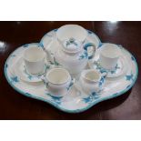 A Minton duet set, Blue Ivy pattern no B194, comprising teapot, cups, saucers, milk jug,