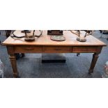 A substantial oak library table/desk, moulded rectangular top with inset writing surface,