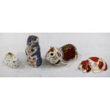 A Royal Crown Derby paperweight, Guinea Pig, gold stopper, boxed; others, Chipmunk, Puppy,