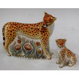 A Royal Crown Derby paperweight, Cheetah, gold stopper, boxed; another, Cheetah Cub, gold stopper,