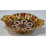 A Royal Crown Derby 1128 pattern solid gold band two handled pedestal dish, printed mark in pink,