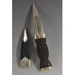 A George V silver mounted Scottish sgian dubh, 8cm fullered and part-serrated blade,