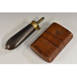 A mid-19th century English patinated copper powder flask, for an 1851 colt, of typical form,