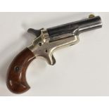 A Colt .41 calibre Derringer rim-fire pocket pistol, 6.