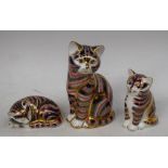 A Royal Crown Derby paperweight, Seated Cat, printed marks, gold stopper; others, similar,