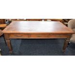 A substantial oak library table/desk, moulded rectangular top with inset writing surface,